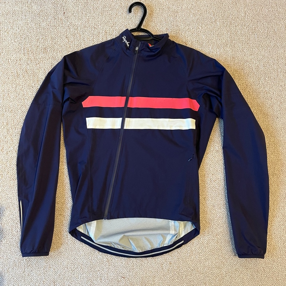 Rapha core rain jacket, size small, pink and white reflective stripe.